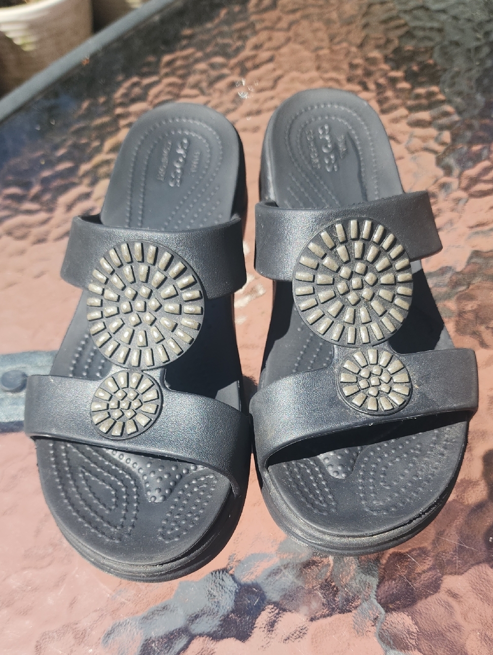 CROCS Black Two-Strap Slide Sandals with Gold Medallions
